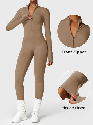 Yeoreo Belle fleece-lined jumpsuit in beige with front zipper and fitted silhouette, ideal for colder days.